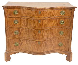 Two Piece Lot of Irion Furniture to include a tiger maple reverse serpentine chest having shaped top over conforming drawers, all set on bracket feet 