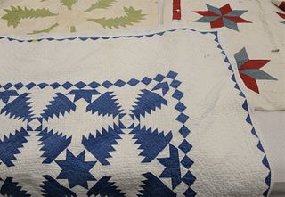Group of Three Quilts, red white and blue star pattern, green and white flower, and a blue and white star pattern, 6' x 6'. Provenance: The Estate of 