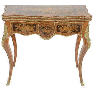 Important Louis XV Table having shaped top opening to felt interior with inlaid top and frieze on cabriole legs, all with brass mounts, height 30 1/2 