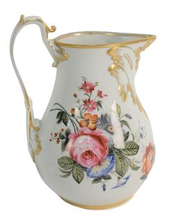Sevres Porcelain Pitcher having painted flowers and gilt decoration, height 10 inches.