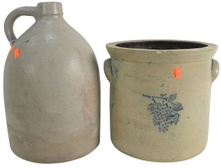 Two Piece Stoneware Lot to include a two gallon crock with blue grapes, along with a two gallon jug, (rim chips). Provenance: From a Newport, Rhode Is