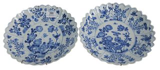 Pair of Molded Blue and White Scalloped Dishes, Kangxi 18th century with floral decoration, diameter 9 1/2 inches.