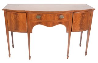Margolis George III Style Mahogany Sideboard having one drawer flanked by doors all set on square, tapered legs ending in spade feet, drawer with dile