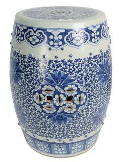Chinese Blue and White Barrel Garden Seat with floral decoration throughout having double coin reticulated handles, 19th/20th century, height 19 inche