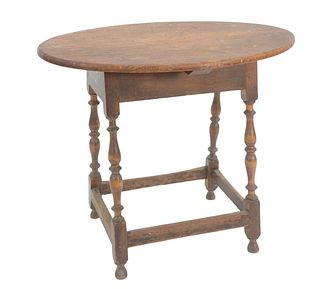 Queen Anne Table having oval top on turned legs with stretchers, height 24 1/2 inches, top 20" x 28".