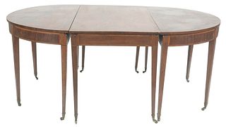 George IV Mahogany Three Part Dining Table, having demilune ends all with banded inlaid top and frieze set on square tapered legs and casters, circa 1