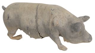 Large Lead Pig Garden Ornament, one leg bent, chewed ears, tail and nose, height 11 1/2 inches, length 24 1/2 inches. Provenance: The Estate of Diana 