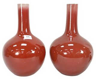 Pair of Chinese Oxblood Glazed Porcelain Gourd Vases, drilled, height 15 1/2 inches. Provenance: Collection from Mr. and Mrs. Fowler, West Hartford, C