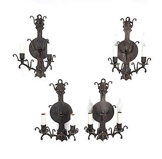 * A Set of Four Iron Two-Light Sconces Height 17 inches.