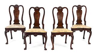 * A Set of Four George II Walnut Side Chairs Height 39 1/2 inches.