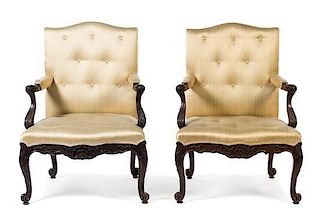 * A Pair of George II Style Carved Mahogany Library Chairs Height 38 1/2 inches.