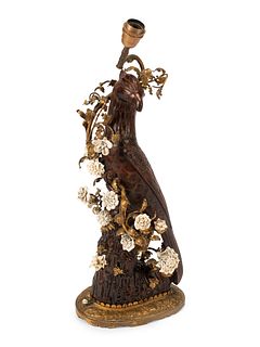A German Gilt Bronze, Porcelain and Lacquered Wood Model of a Bird Mounted as a Lamp
Height overall 29 x width 9 x depth 8 inches.