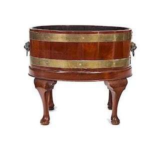 * A George III Mahogany Cellarette Height 21 1/2 x width 25 inches.
