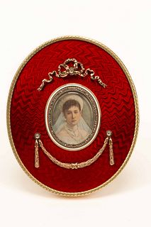 A Vari-Color Gold, Diamond and Guilloche Enamel Picture Frame
Height 5 x width 4 inches.