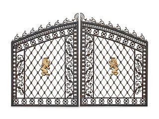 A Pair of Gates with Gilt Rampant Lion Ornaments
Height of each gate 107 x width 78 1/2 inches per side, total of 157 inches.