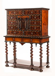 A Louis XIV Burlwood, Fruitwood and Ebony Cabinet on Stand
Height 66 x width 48 1/2 x depth 21 1/2 inches.