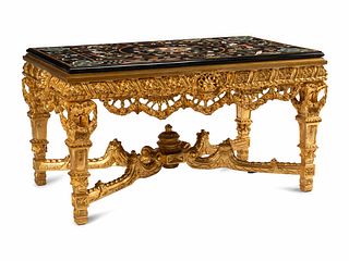 A Louis XIV Style Giltwood Specimen Marble-Top Table
Height 33 x width 60 x depth 37 inches.