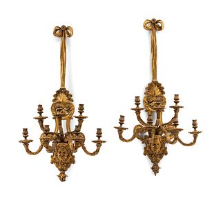 A Pair of Regence Style Gilt Bronze Seven-Light Sconces
Height 44 x width 24 1/2 inches.