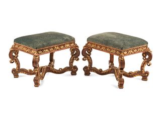 A Pair of Regence Style Parcel Gilt Benches
Height 19 x width 26 x depth 19 1/2 inches.