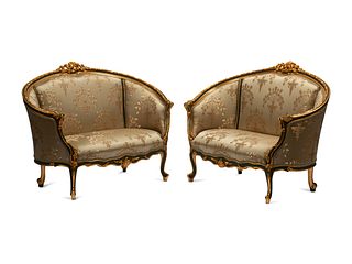 A Pair of Louis XV Style Painted and Parcel Gilt Settees
Height 38 x width 51 x depth 28 inches.