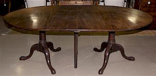 * A George III Mahogany Extension Dining Table Height 28 1/4 x length 80 x depth 55 inches (closed).