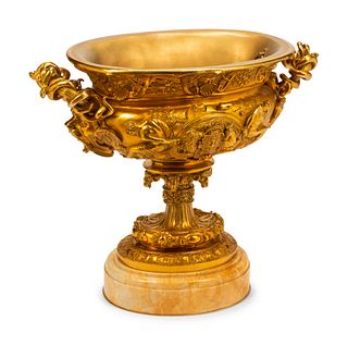A Large French Gilt Bronze Jardiniere
Height 27 x width 30 1/2 x depth 17 inches.