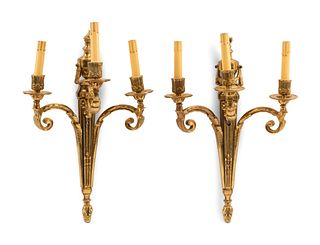 A Pair of French Gilt Bronze Sconces
Height 22 1/2 x width 12 1/2 inches.