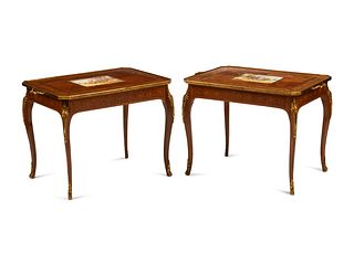 A Pair of Louis XV Style Gilt Bronze and Porcelain Mounted Marquetry Tables
Height 22 1/2 x width 30 1/2 x depth 20 inches.