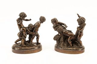 A Pair of French Patinated Bronze Figural Groups
Height 9 1/2 inches.
