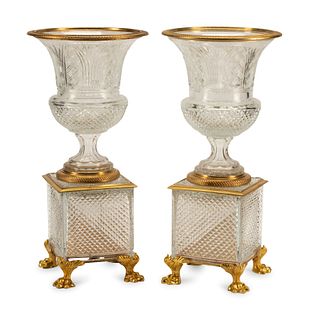 A Pair of French Gilt Bronze Mounted Cut Glass Urns
Height 21 x diameter 10 inches.