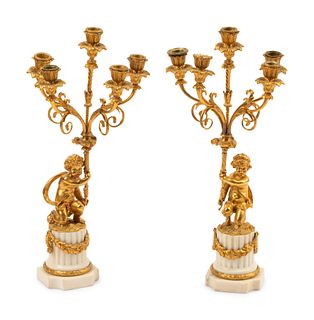 A Pair of Louis XVI Style Gilt Bronze and Marble Figural Candelabra
Height 18 1/2 inches.