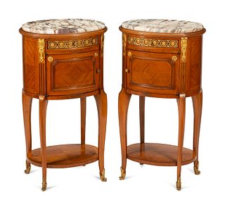 A Pair of Louis XVI Style Gilt Bronze Mounted Marble-Top Side Tables
Height 32 x width 17 1/2 x depth 14 inches.