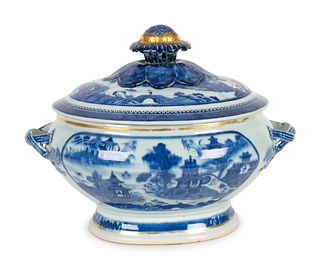 A Chinese Export Blue and White Porcelain Tureen
Height 11 1/2 x width 14 x pth 9 3/4 inches.
