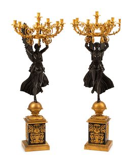A Pair of Monumental Empire Style Gilt and Patinated Bronze Seven-Light Figural Candelabra
Height 53 1/2 inches.