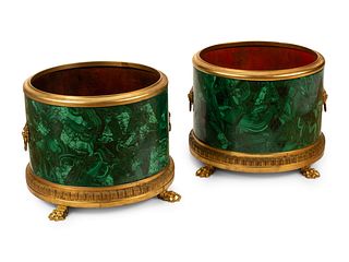 A Pair of Gilt Bronze Mounted Malachite Jardinieres
Height 11 x diameter 14 1/2 inches.