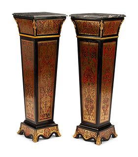 A Pair of Louis XVI Style Boulle Marquetry Marble-Top Pedestals
Height 48 1/2 x width 15 1/2 x depth 15 1/2 inches.