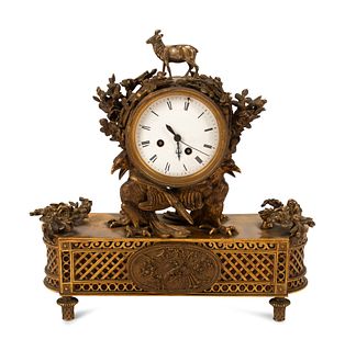 A French Gilt Bronze Mantel Clock
Height 15 1/2 x width 15 x depth 5 inches.