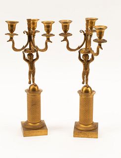 A Pair of Charles X Gilt Bronze Three-Light Candelabra
Height 15 inches.