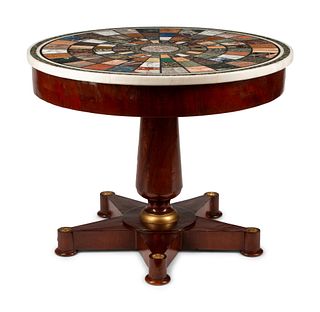 An Empire Style Mahogany Table with a Specimen Marble Top
Height 28 1/2 x diameter of top 36 inches.