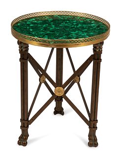 A French Neoclassical Style Patinated Malachite-Top Table
Height 24 x diameter of top 18 1/2 inches.