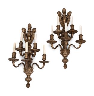 A Pair of Napoleon III Style Silvered Bronze Five-Light Sconces
Height 27 1/2 x width 16 x depth 10 inches.