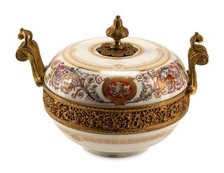 A Sevres Gilt Bronze Mounted Porcelain Centerpiece Bowl and Cover
Height 6 x width over handles 8 1/2 inches.