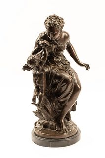 A French Patinated Bronze Figural Group After Moreau
Height 23 inches.