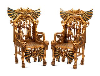 A Pair of Egyptianesque Painted and Giltwood Throne Chairs
Height 55 x width 37 x depth 26 inches.