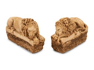 A Pair of Composite Marble Models of Reclining Lions
Height 8 x width 12 inches.