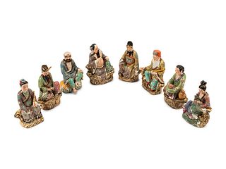 A Set of Eight Chinese Enameled Porcelain Figures of Immortals
Height of first figure 11 1/2 inches.