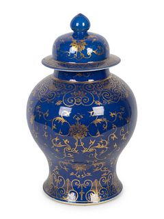 A Chinese Gilt Decorated Cobalt Ground Porcelain Jar
Height 17 x diameter 9 inches.