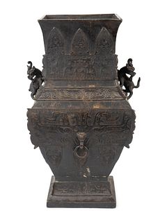 An Archaistic Bronze Vase
Height 17 3/4 x width 9 1/4 x depth 7 3/4 inches.