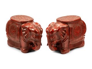 A Pair of Chinese Carved Red Lacquer Elephant Seats
Height 17 x width 27 x depth 12 inches.