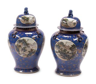 A Pair of Chinese Iron Mounted Porcelain Jars
Height 36 x diameter 19 1/2 inches.